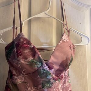 Brand new and Never worn but no tags. Was bought for prom but I changed my mind.